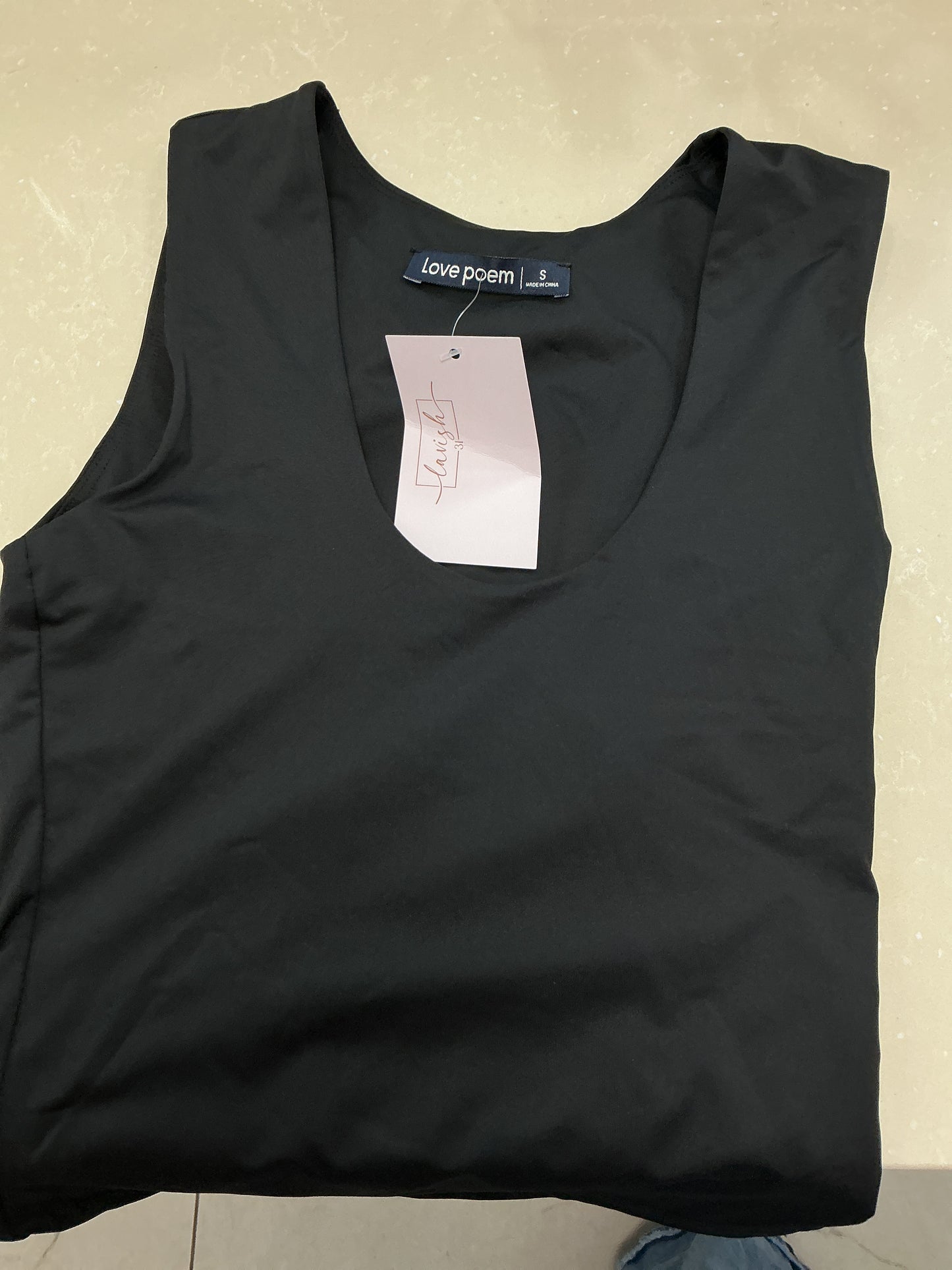 Black swoop neck top