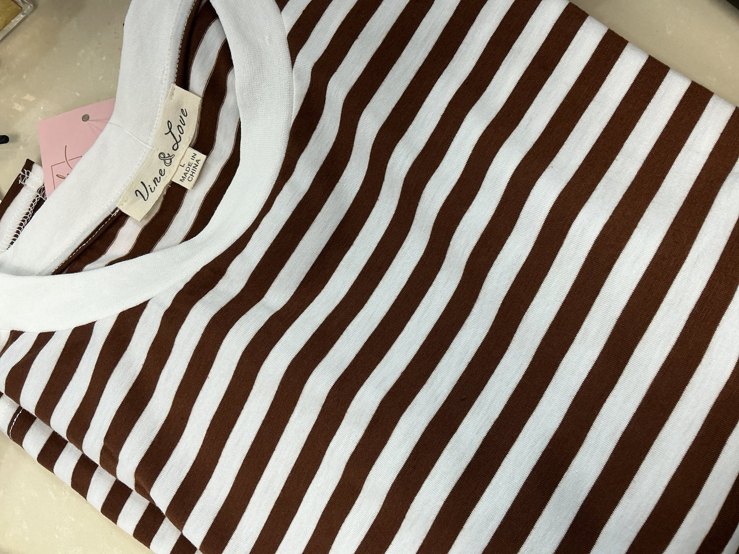 Brown and white striped top