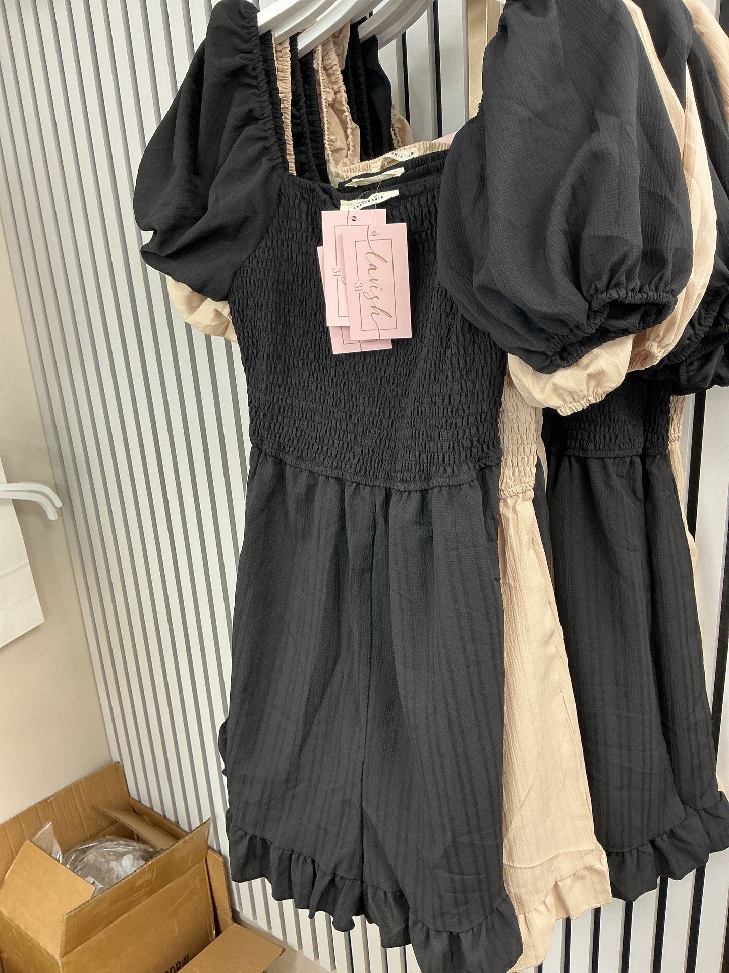 Black romper with ruffle