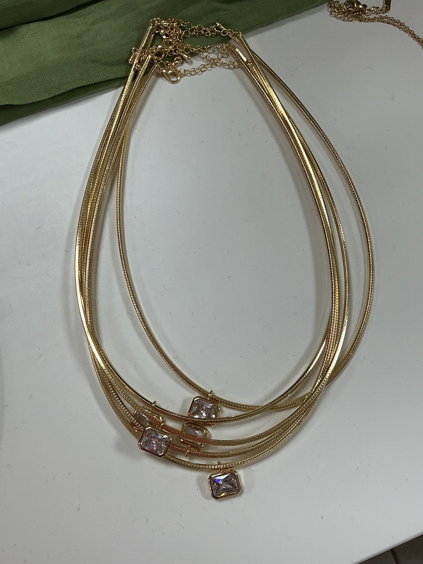 Gold necklace with a diamond