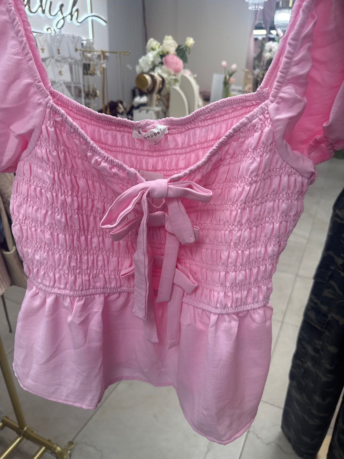 Pink top with big bow