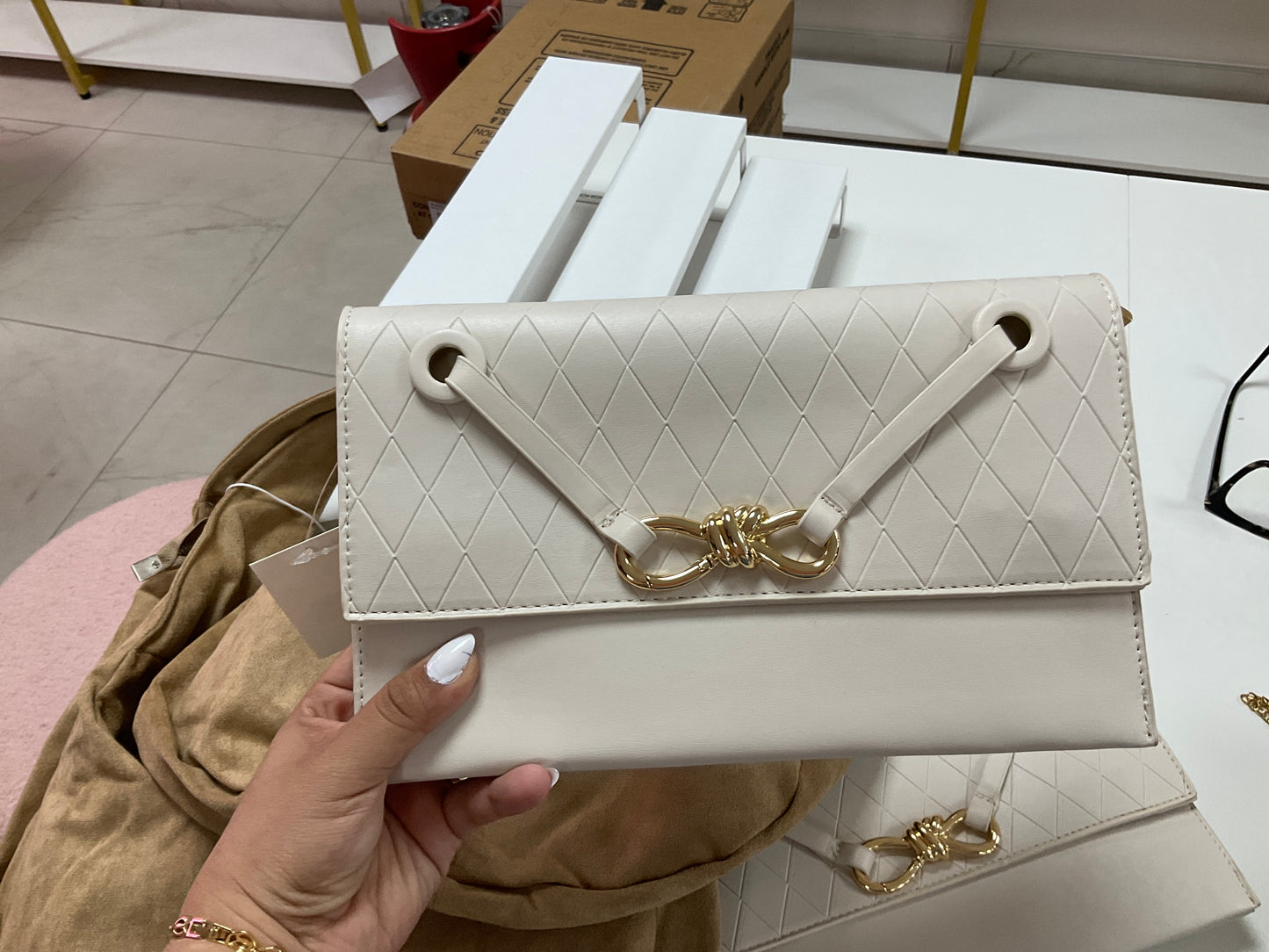 White clutch bag