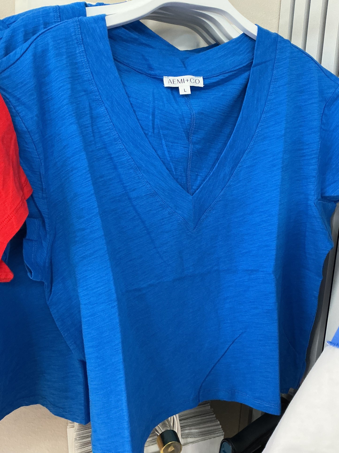 Blue cropped v neck top