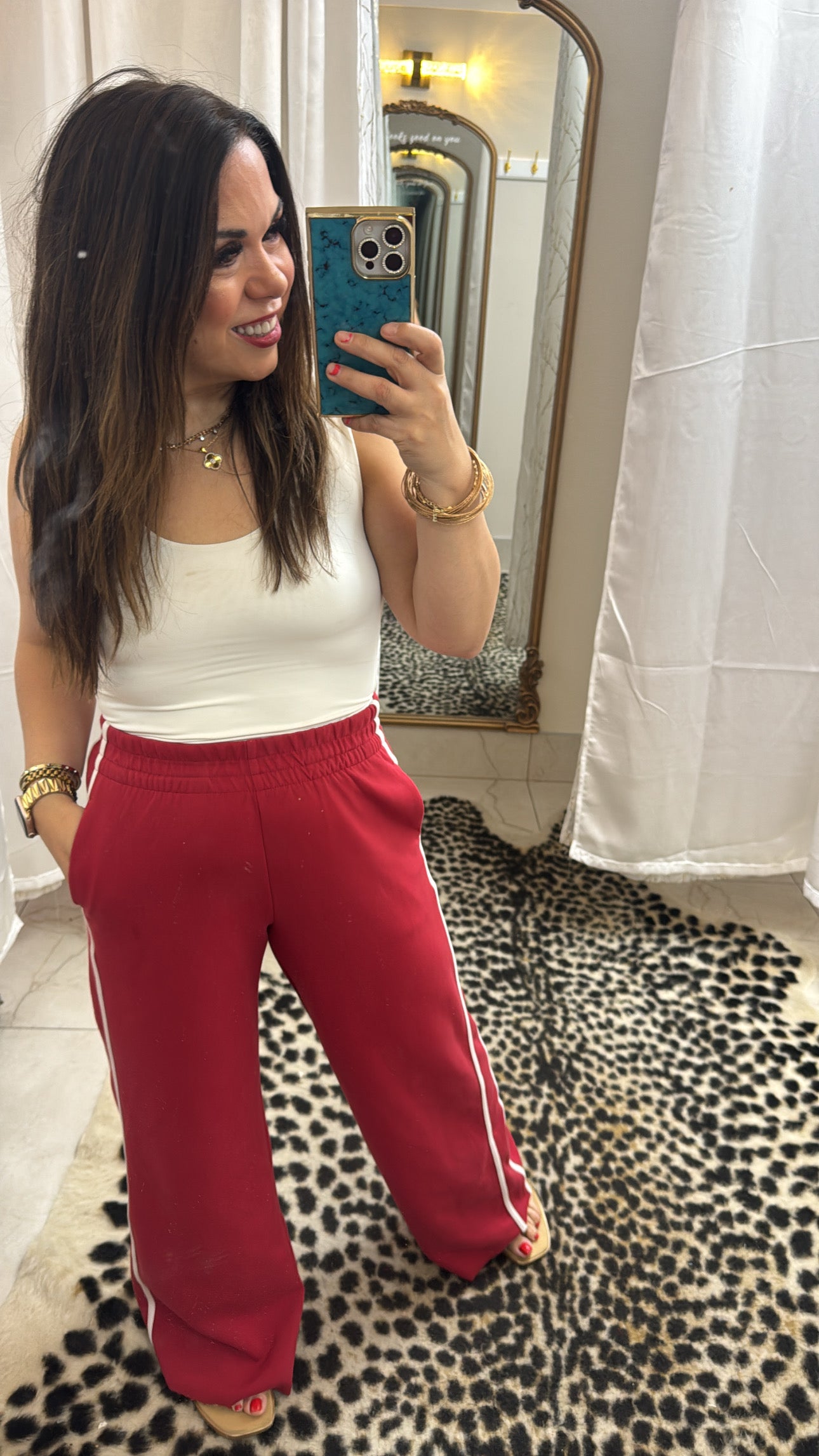 Red sweats with white stripe
