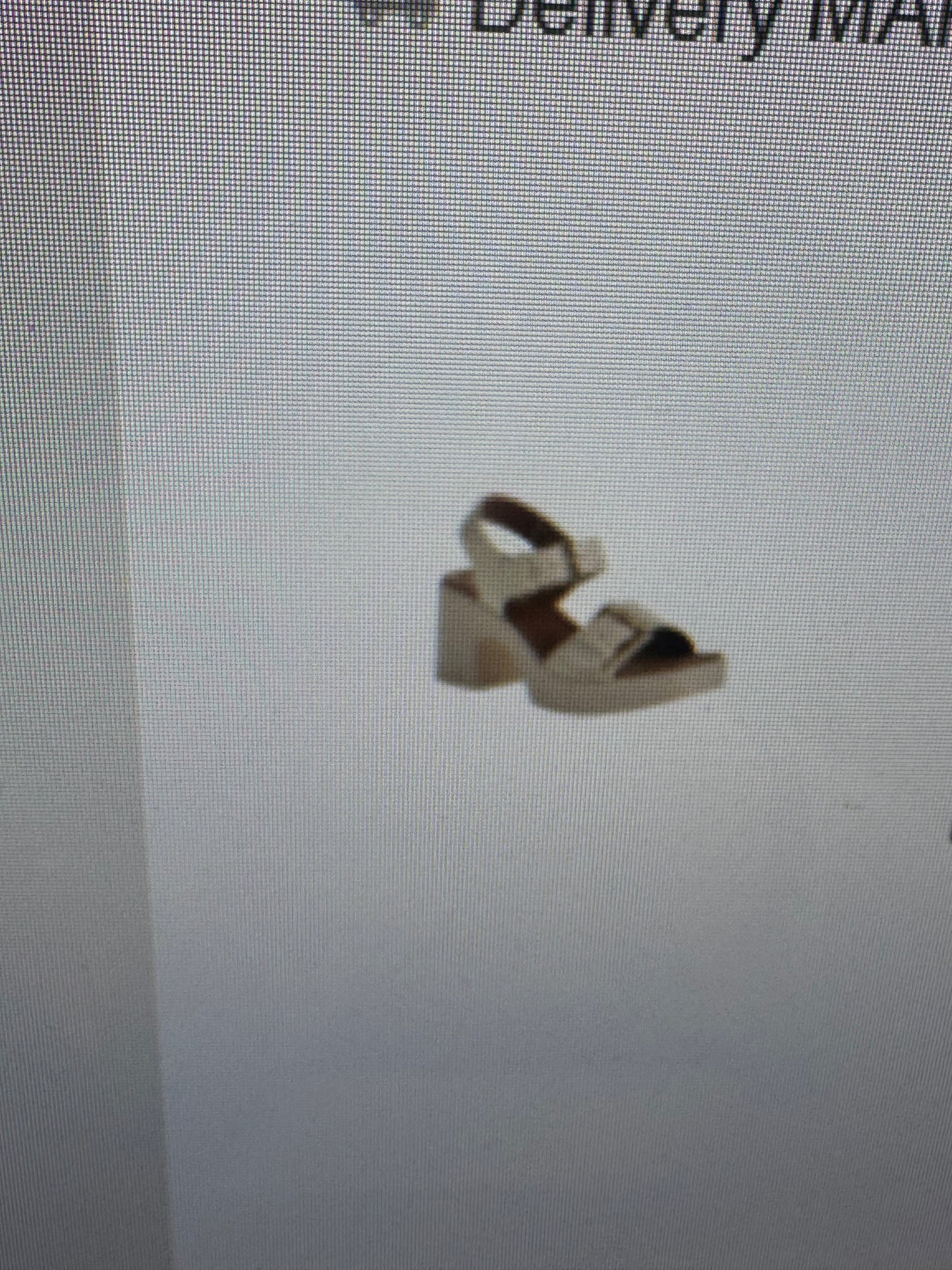 Cream and gold pump