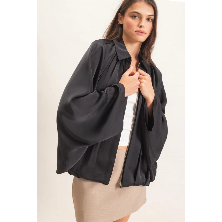 Black bat wing jacket with a gold zipper