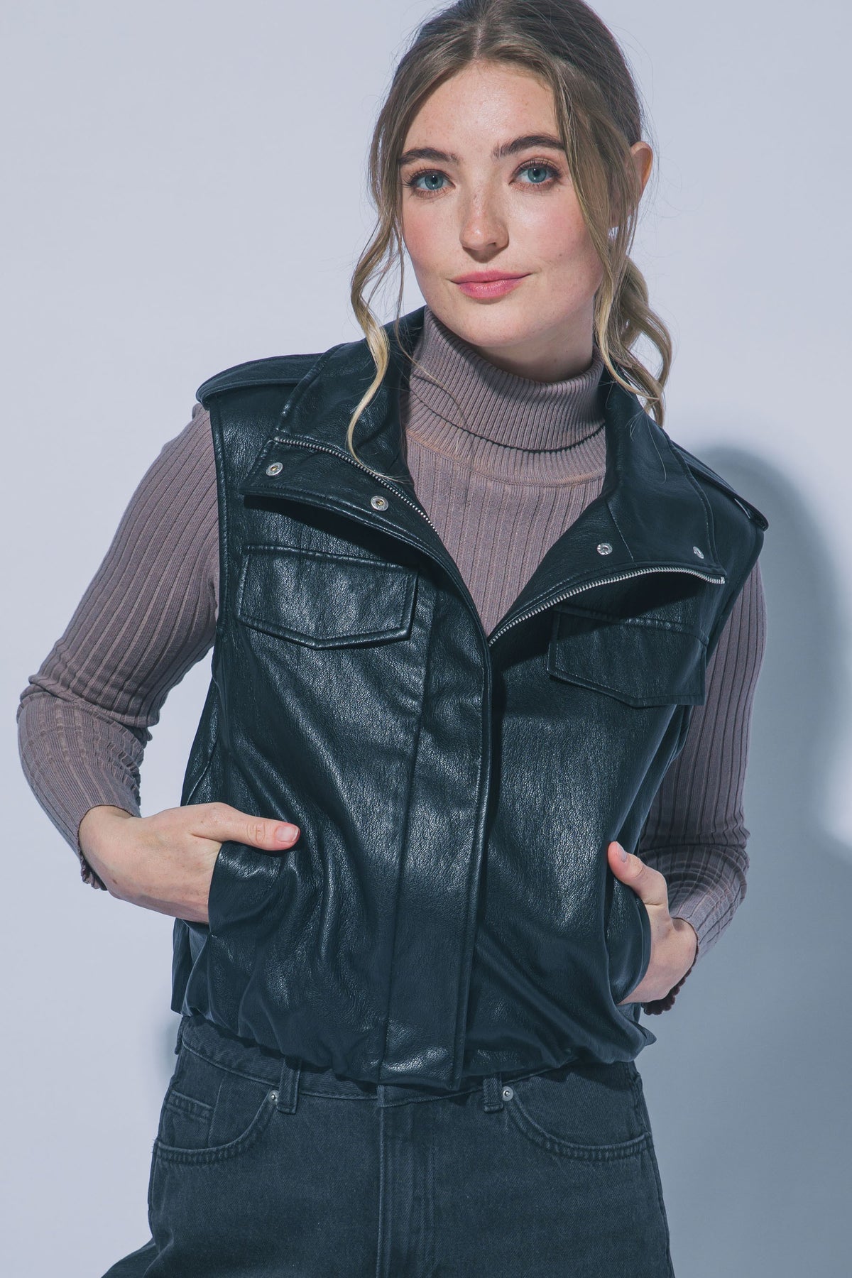 Black leather cropped vest