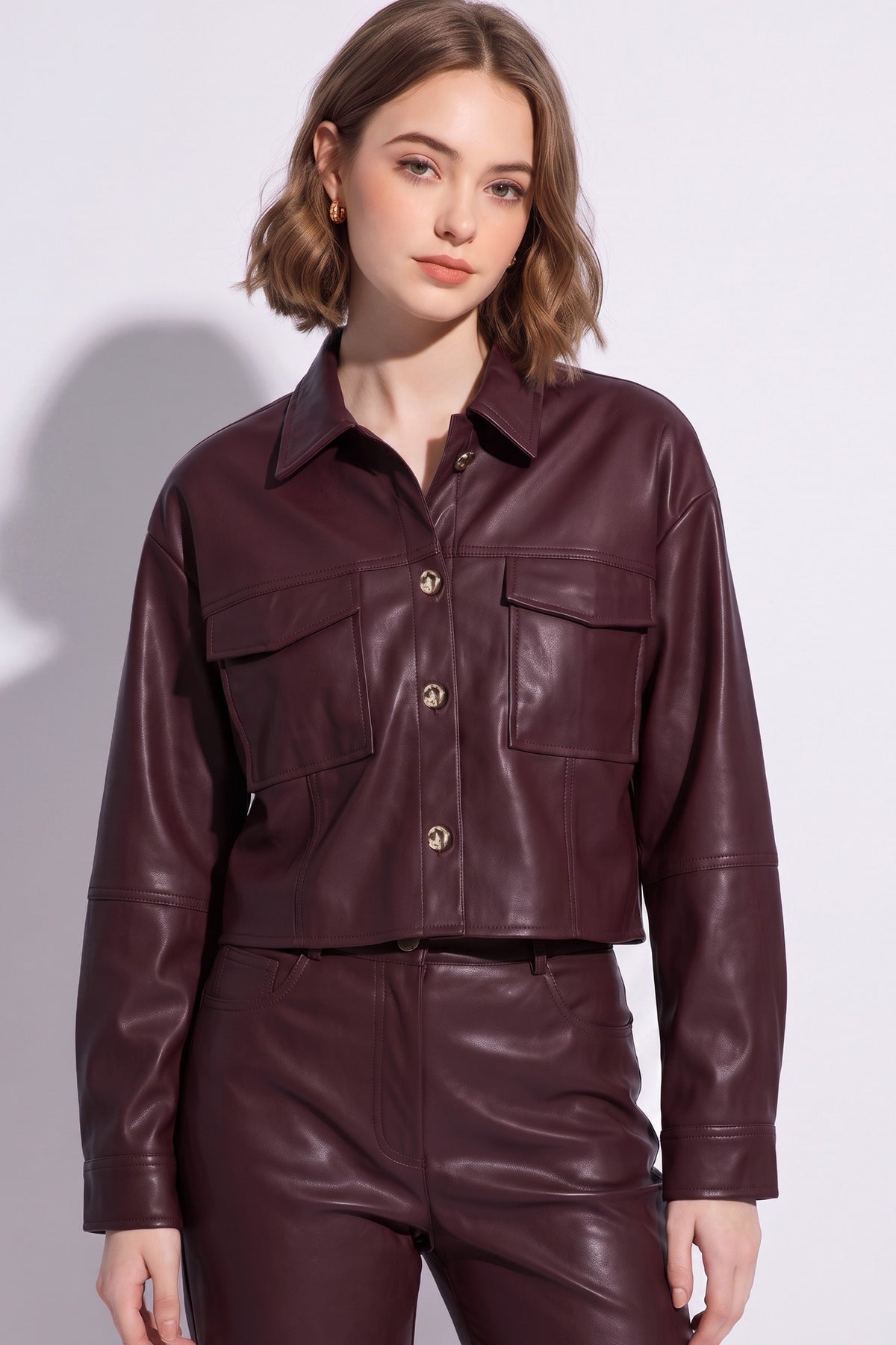 Burgundy cropped leather jacket with gold buttons