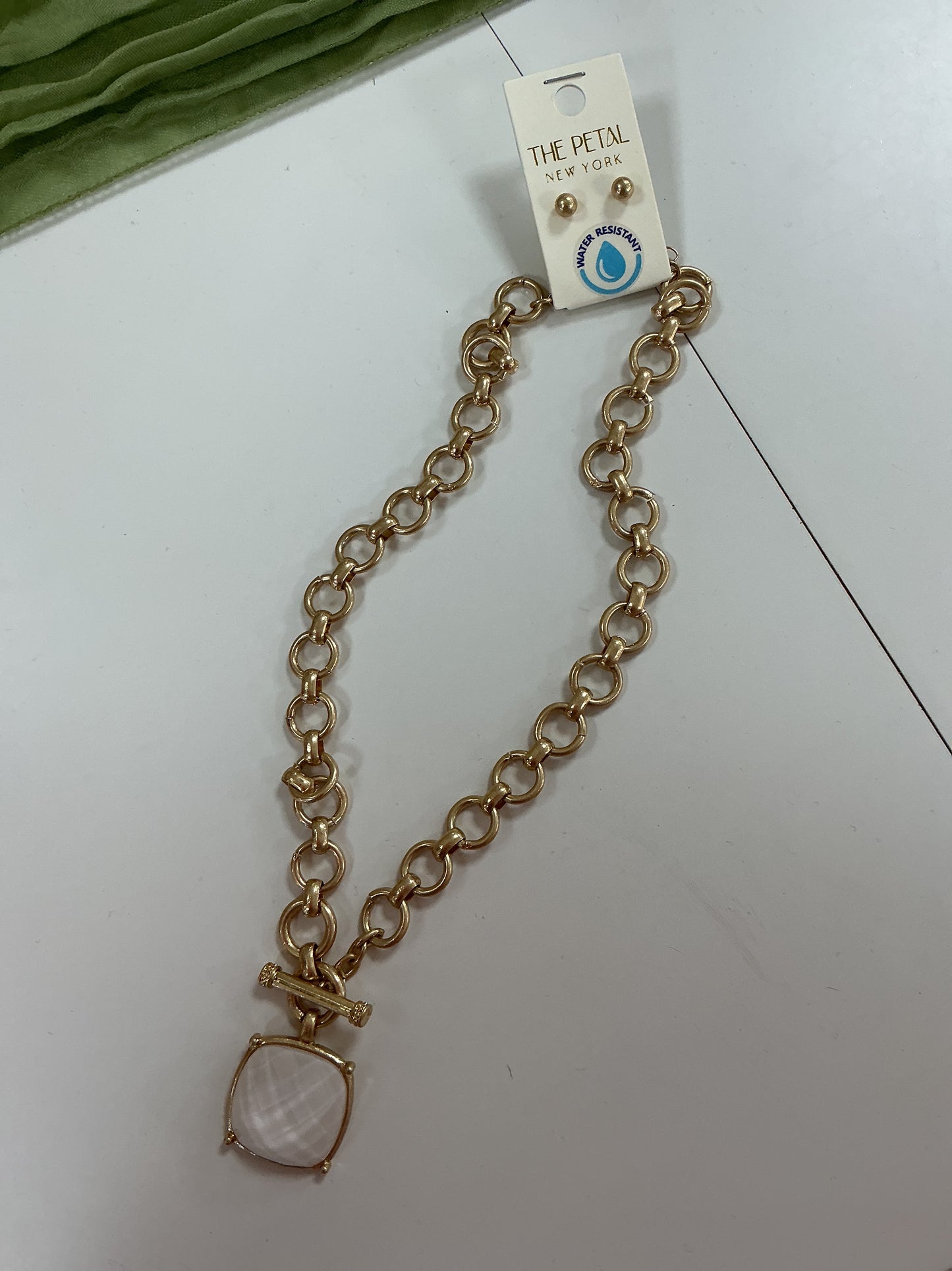 Gold and white stone necklace