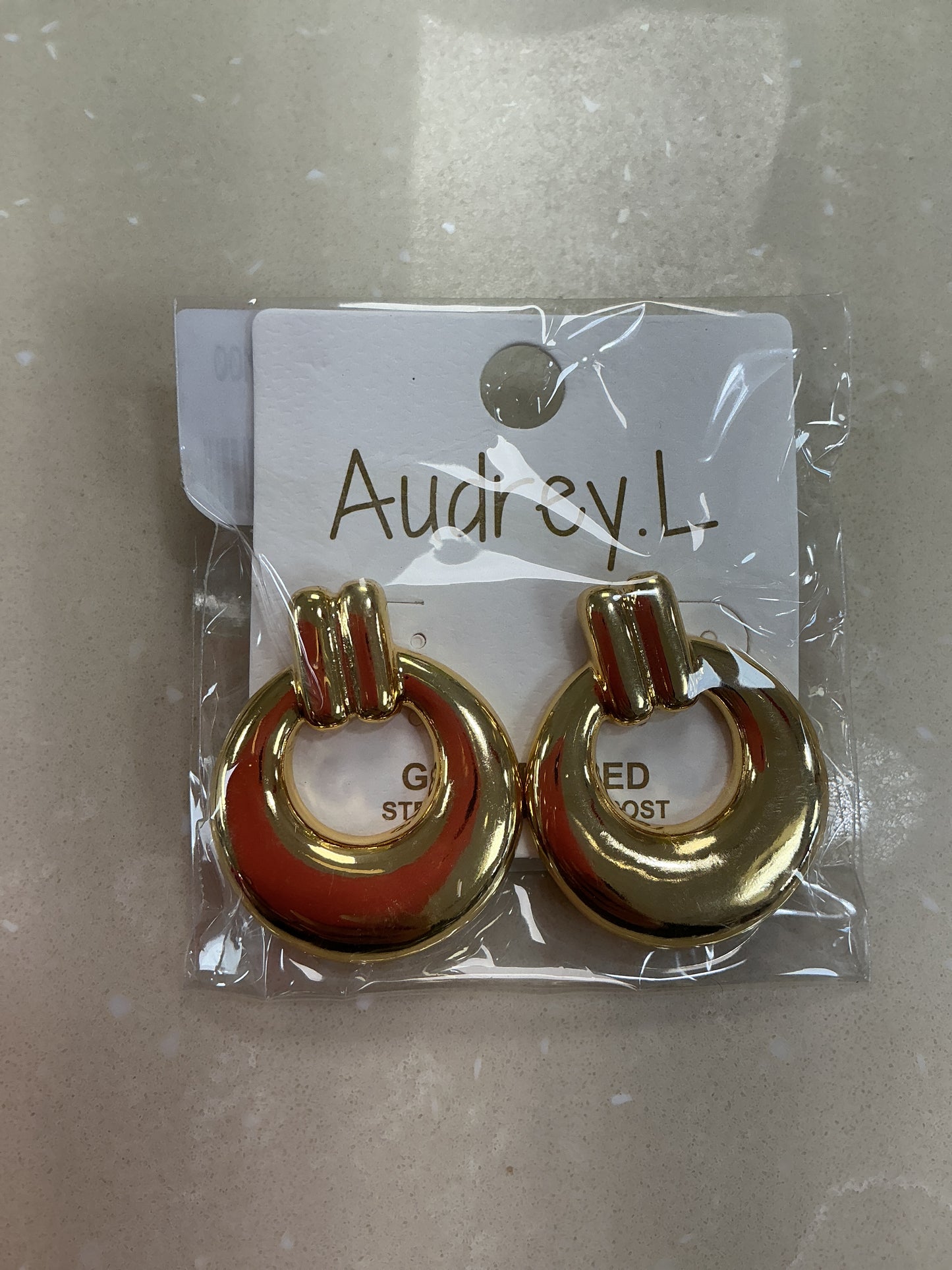 Gold circle earrings