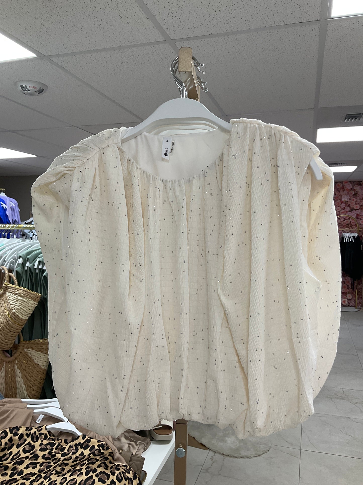Cream top with rhinestones