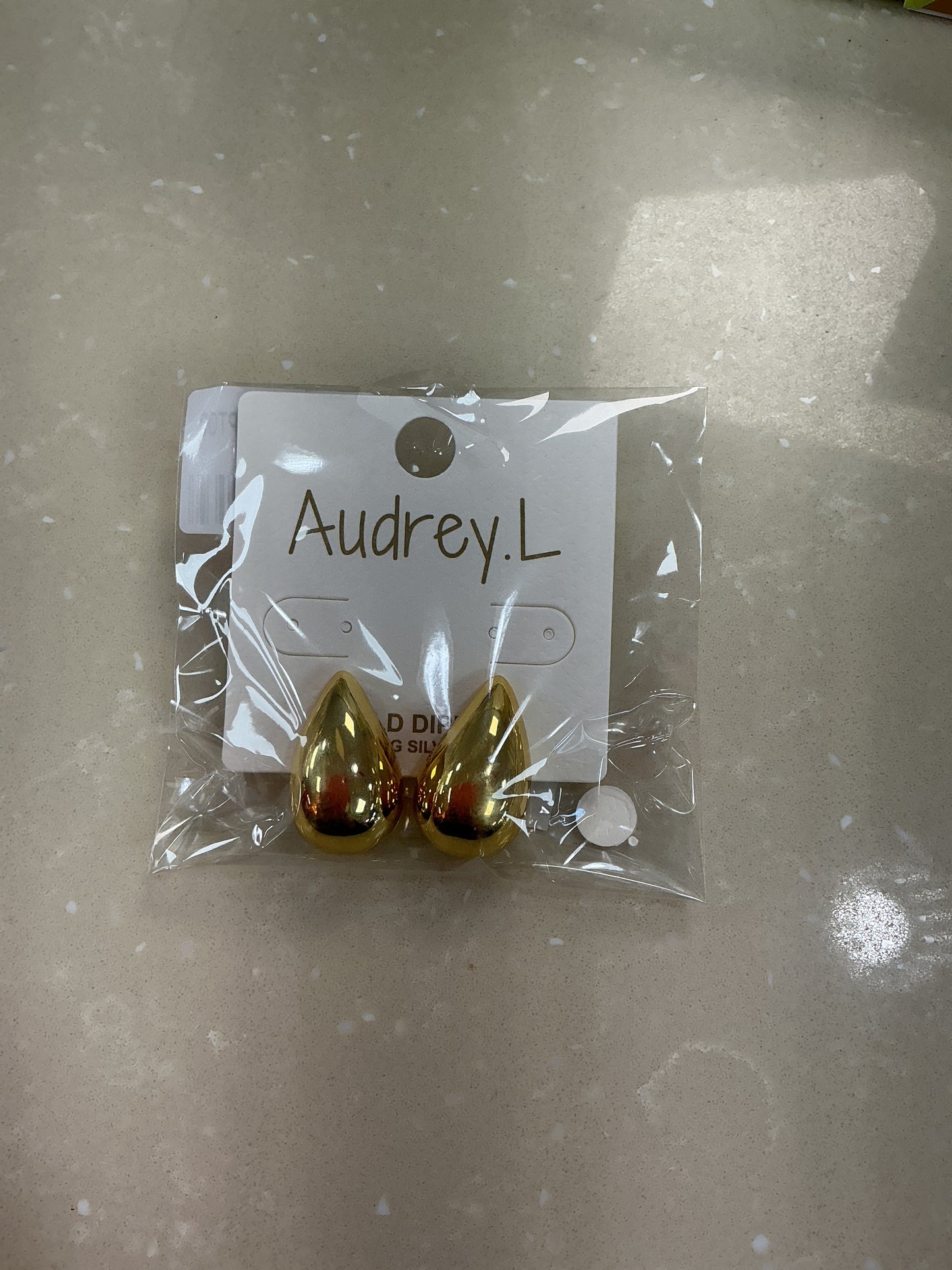 Gold tear drop earrings