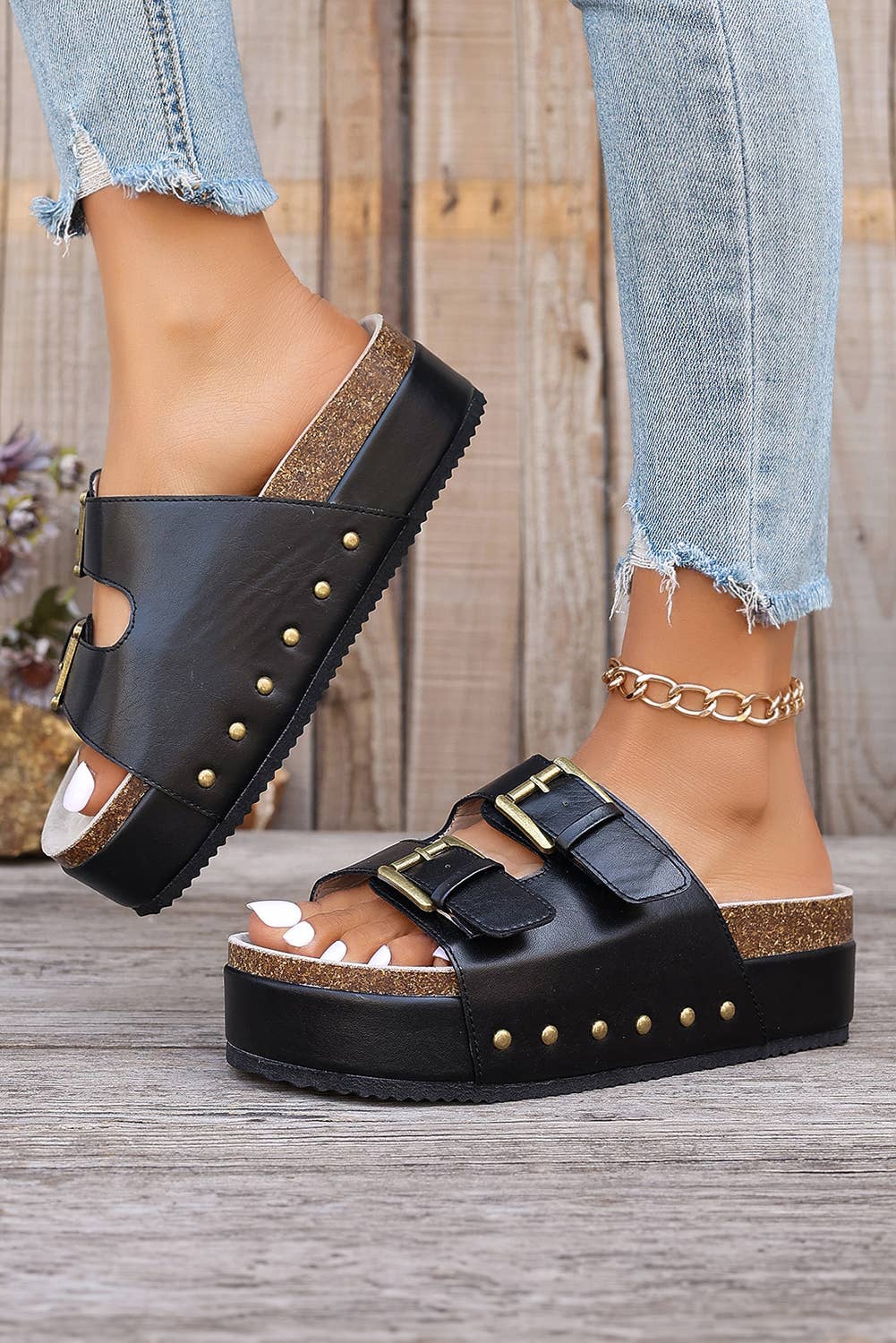 Black sandal with gold buckle