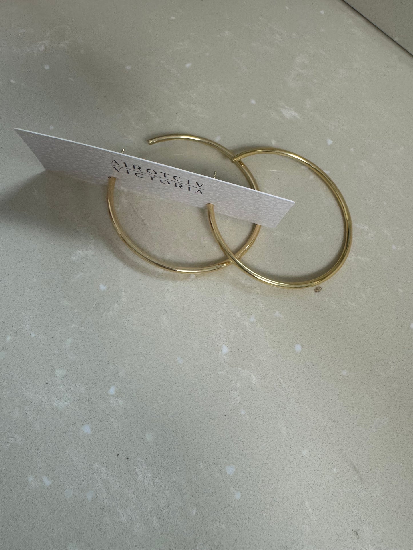 Gold hoop earring