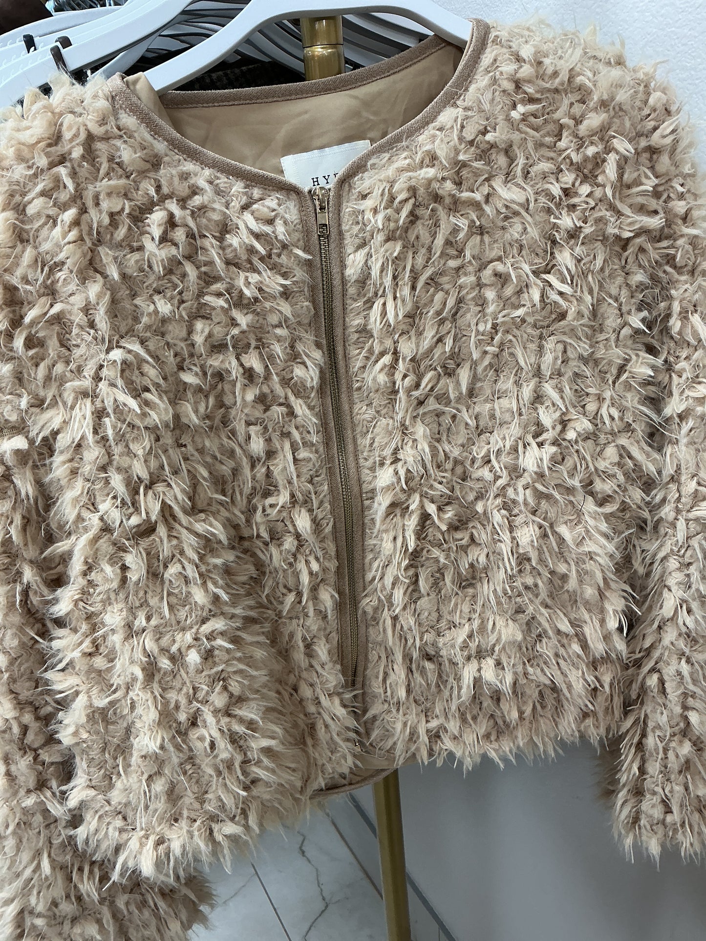 Beige furry jacket