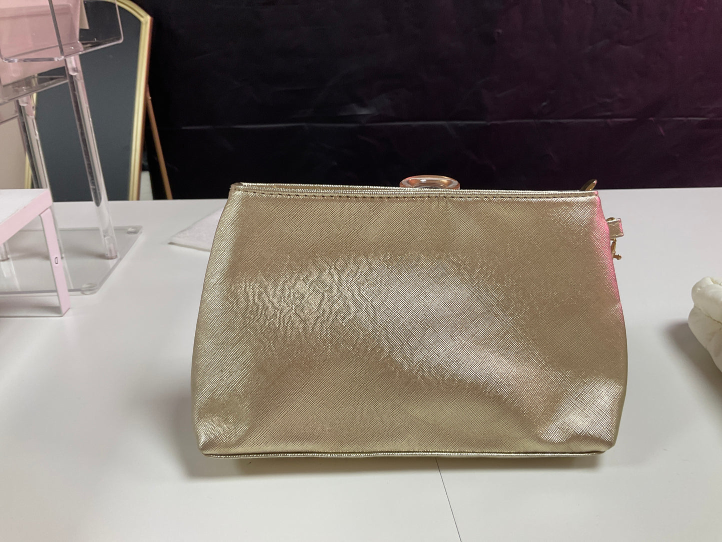 Gold mini makeup bag