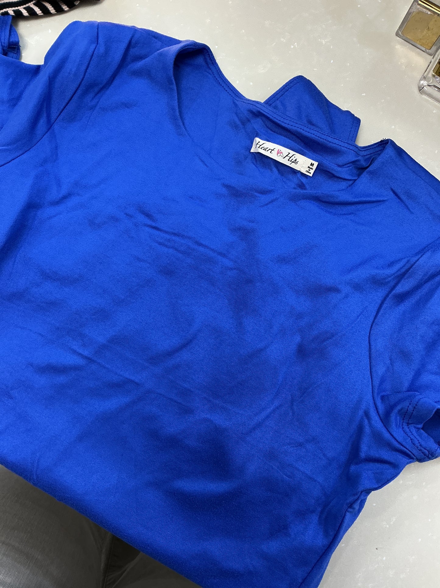 Blue body suit top