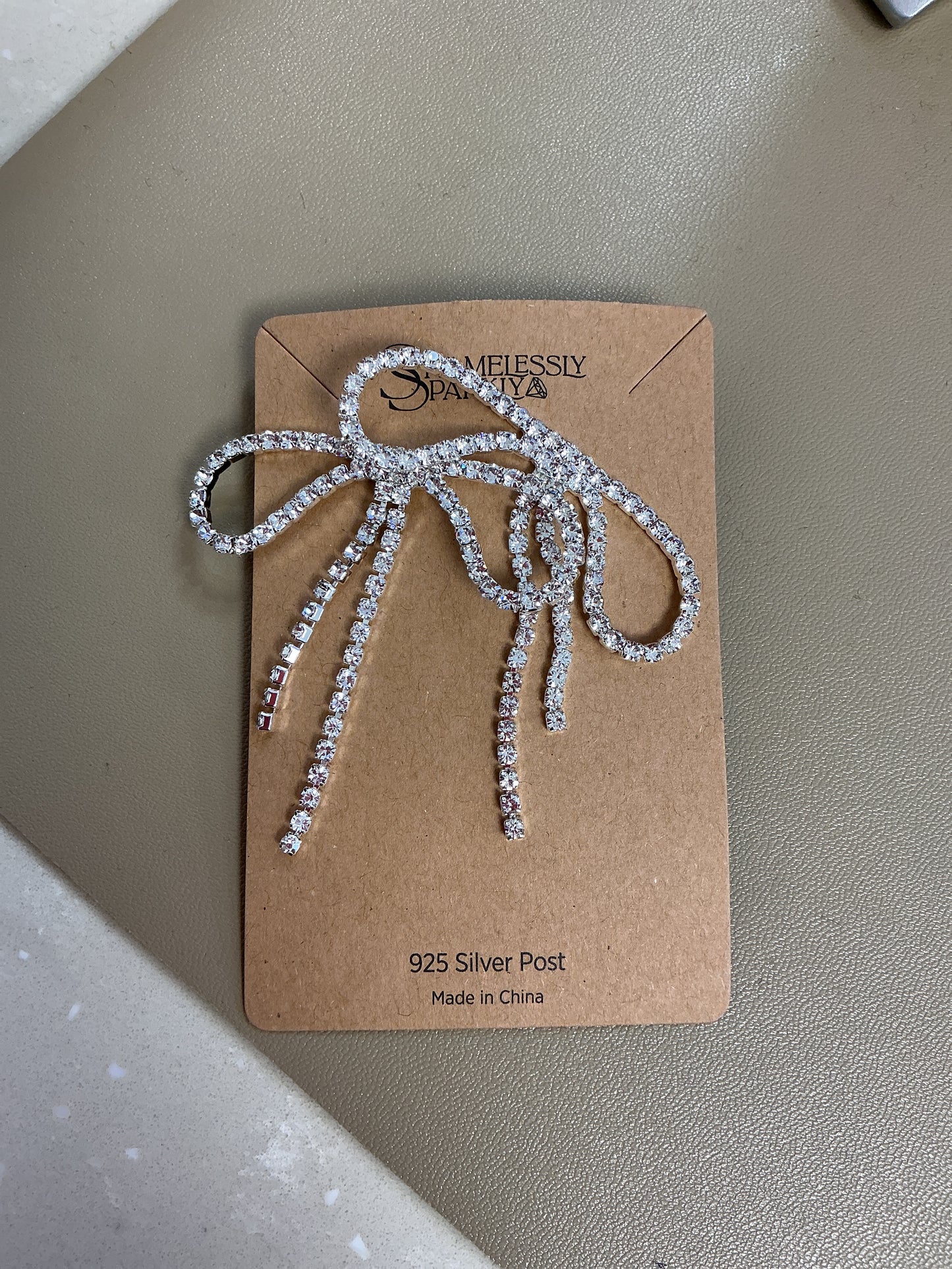 Bow diamond earring