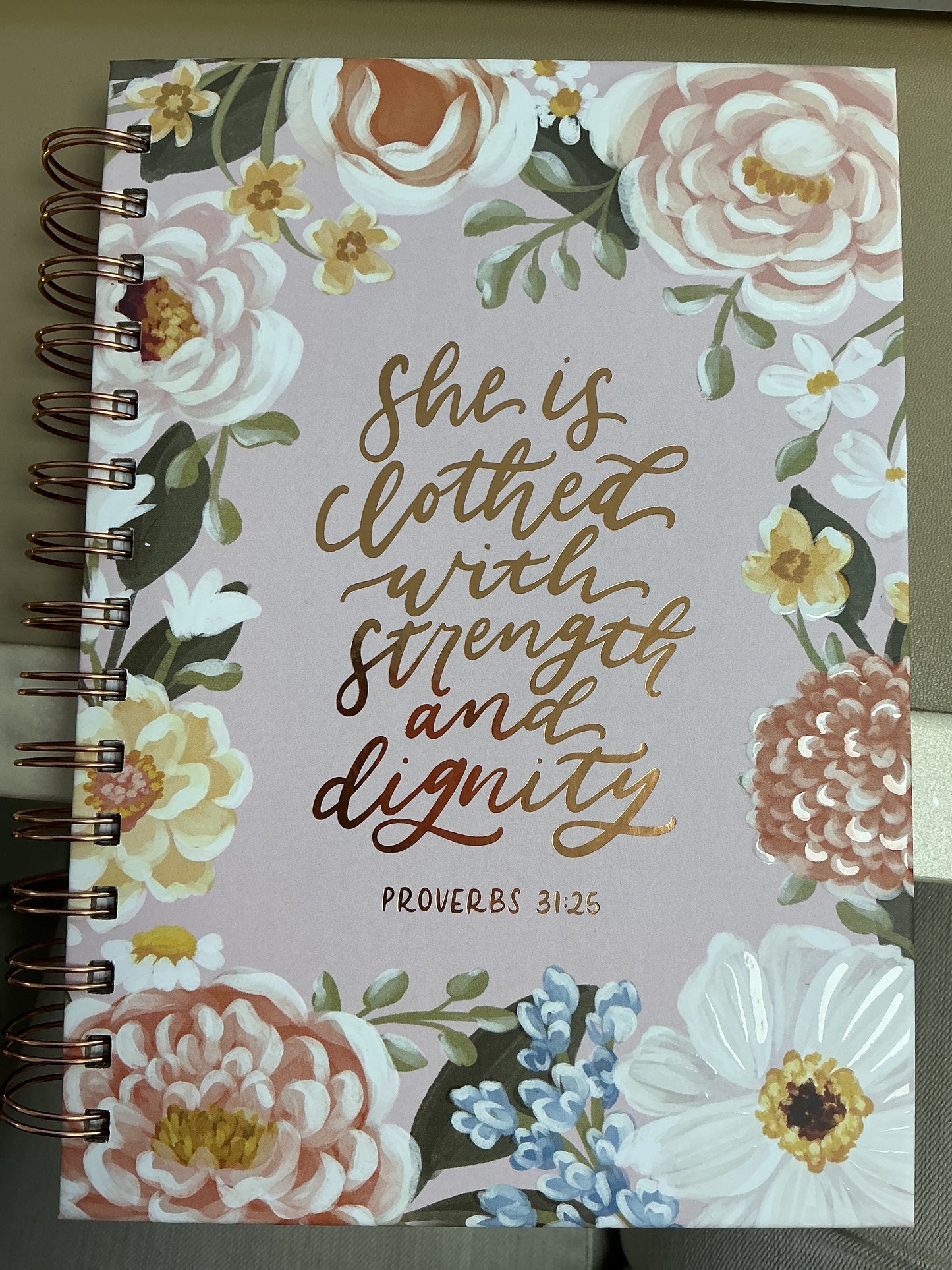 She is clothed in strength and dignity notebook
