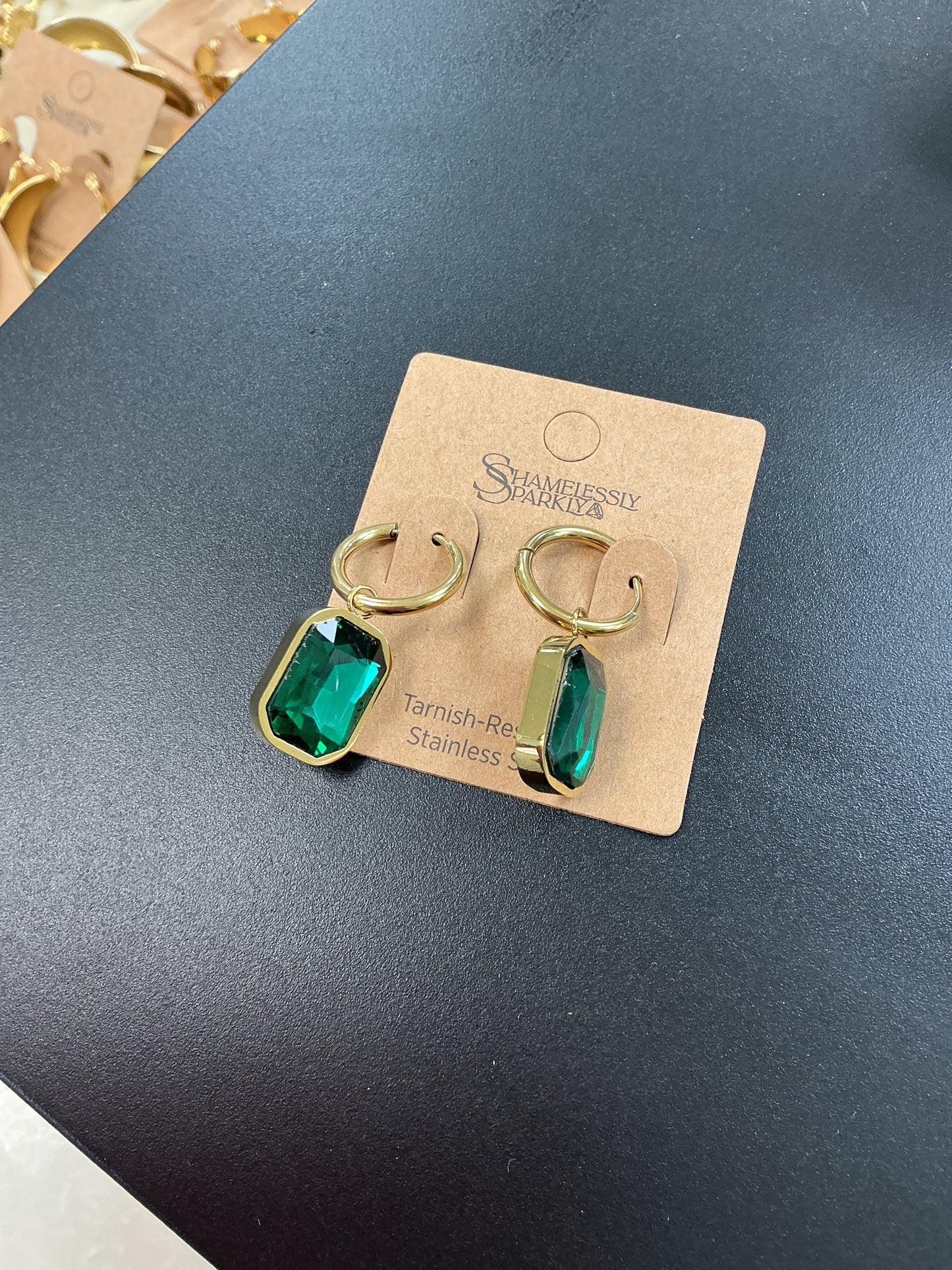 Gold and emerald earrings