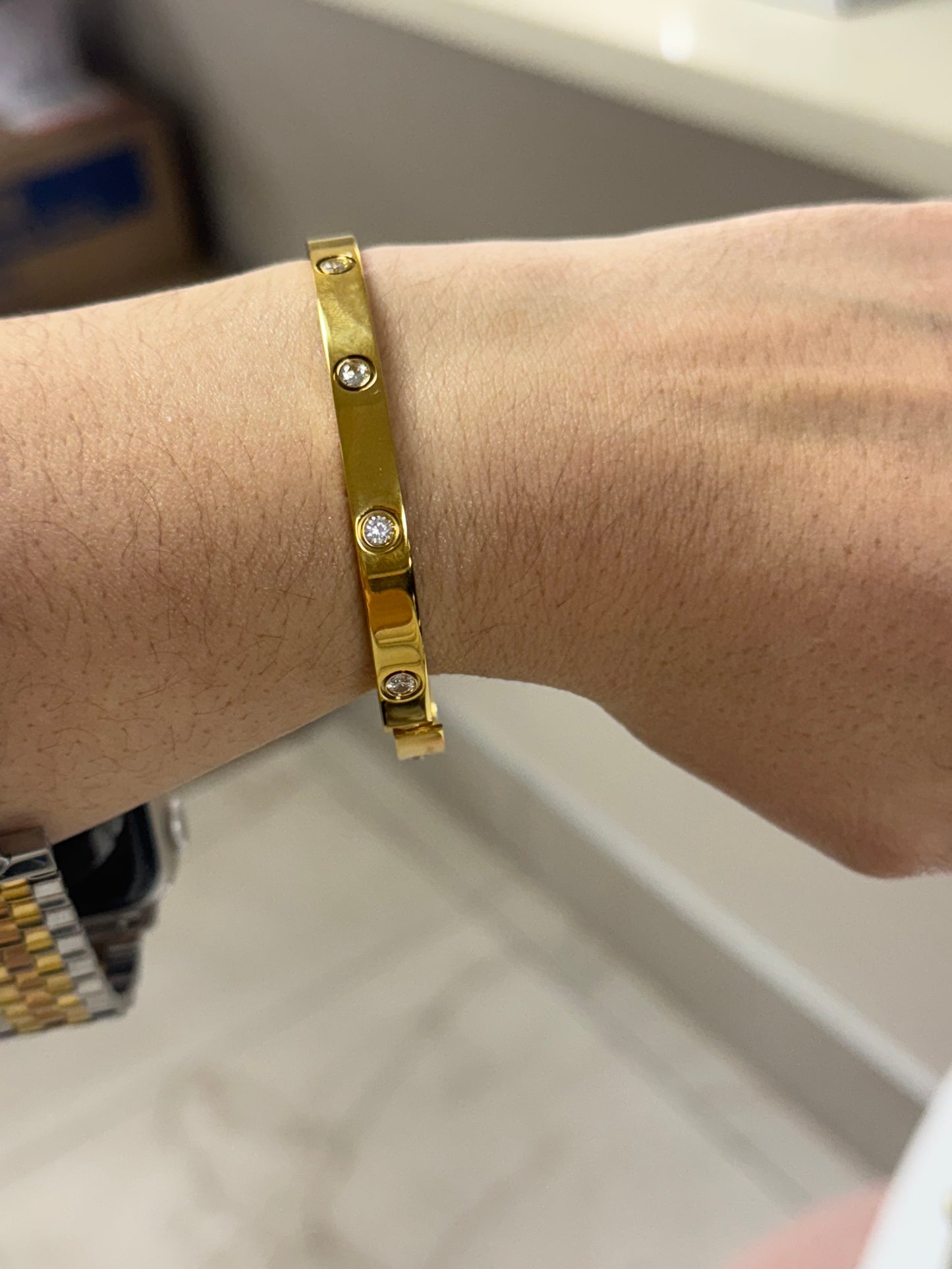 Corinne Gold bangle bracelet