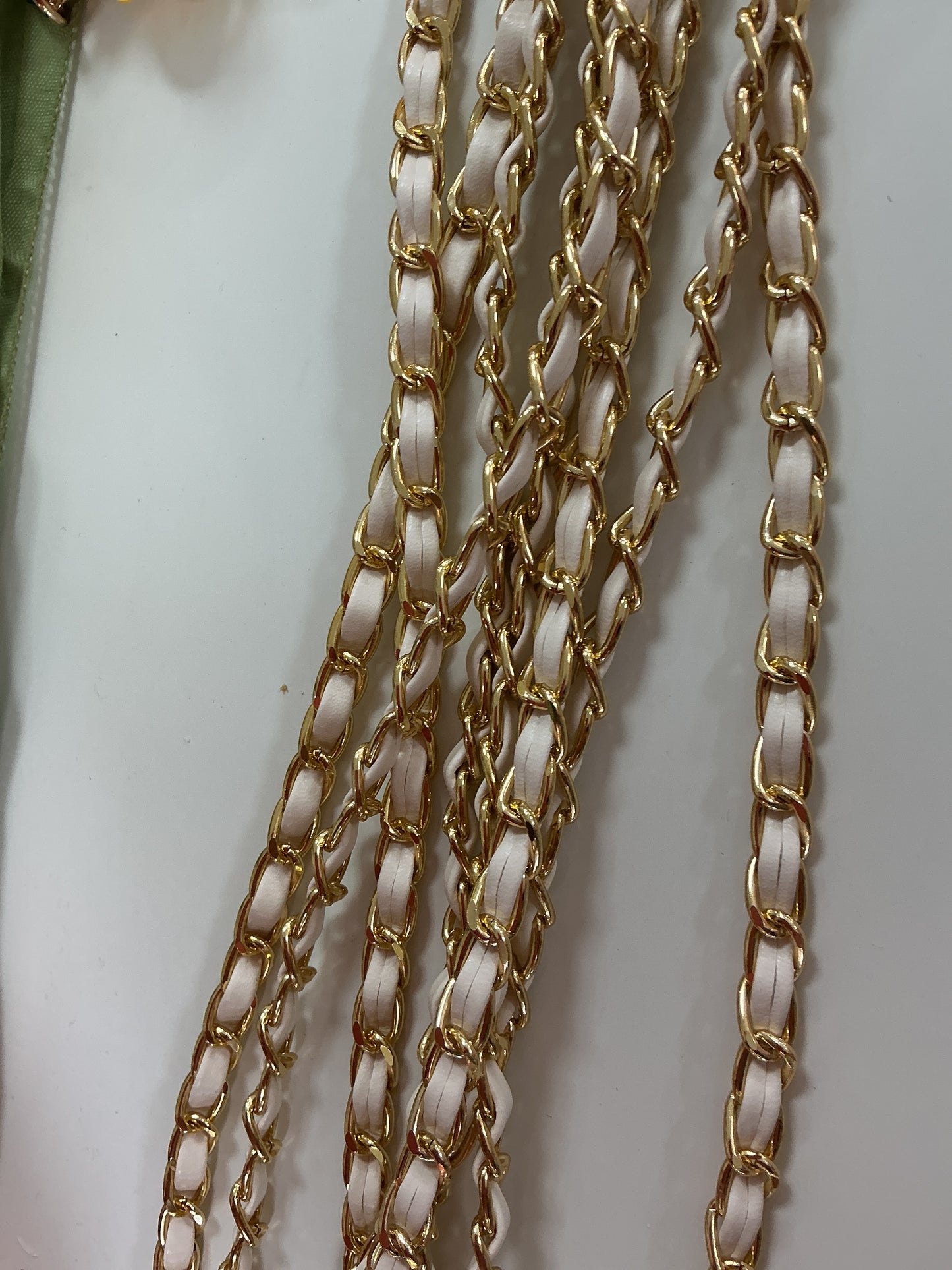 White and gold phone holder