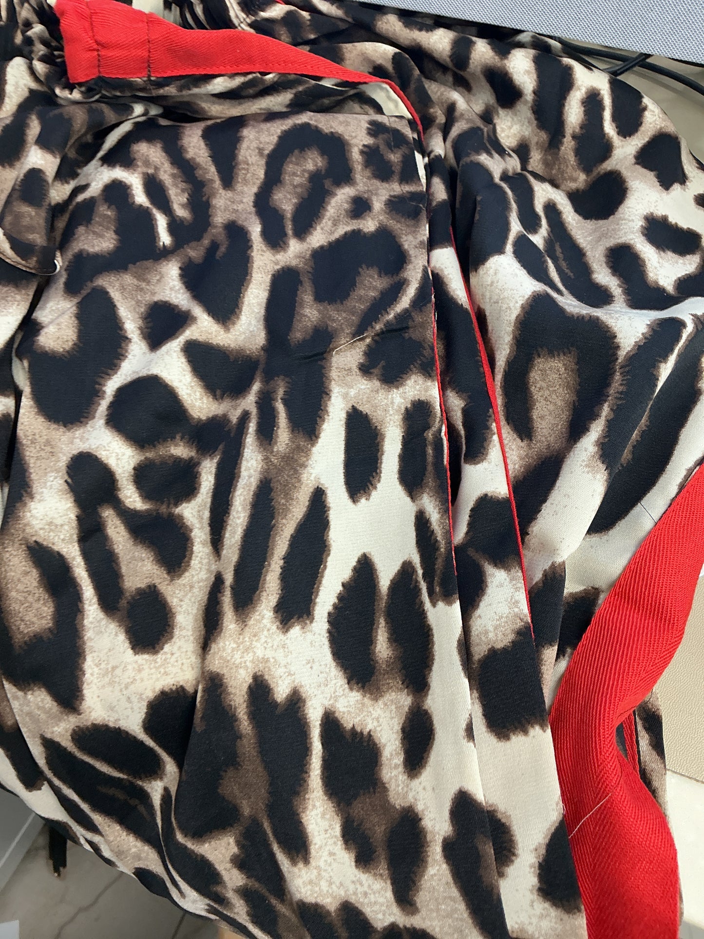Cheetah pants with red stripe