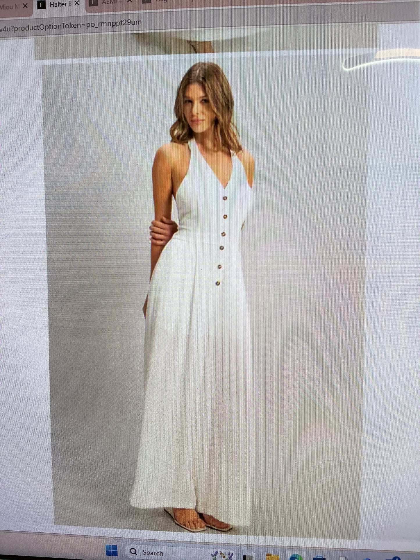 White romper with open back