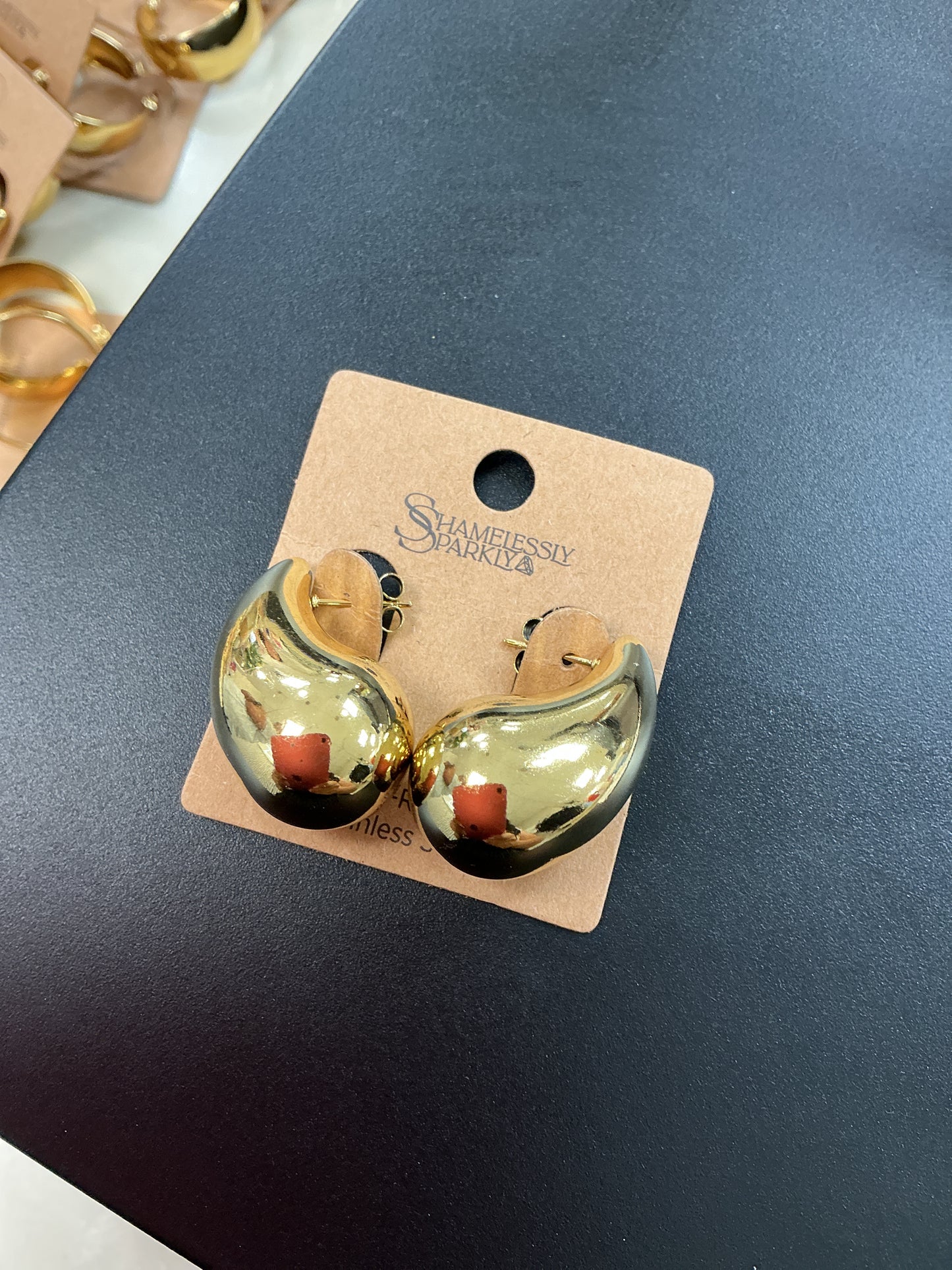 Gold tear earring
