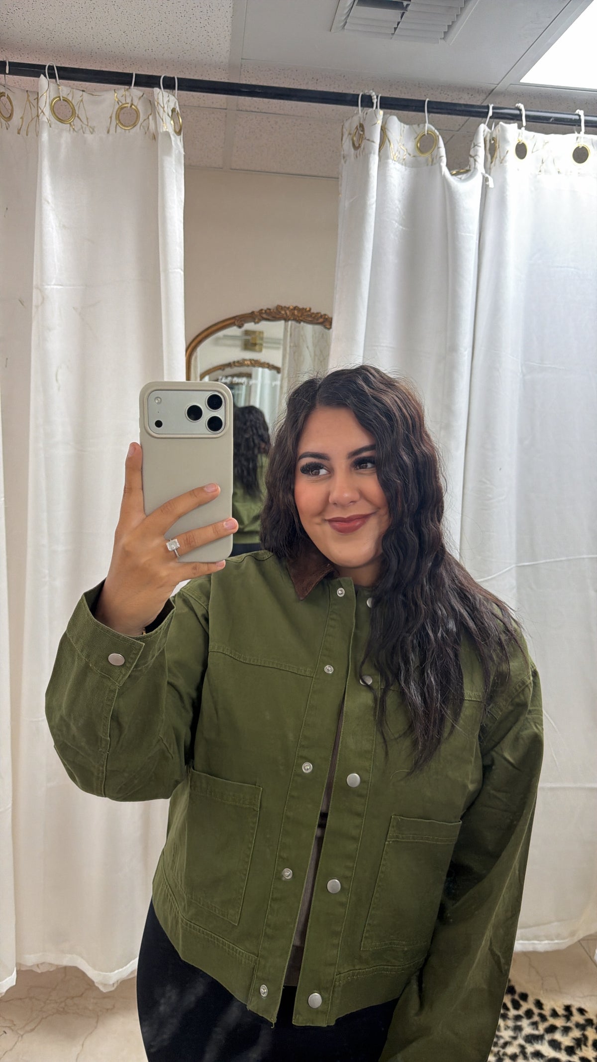 Dark olive jacket with a brown corduroy collar