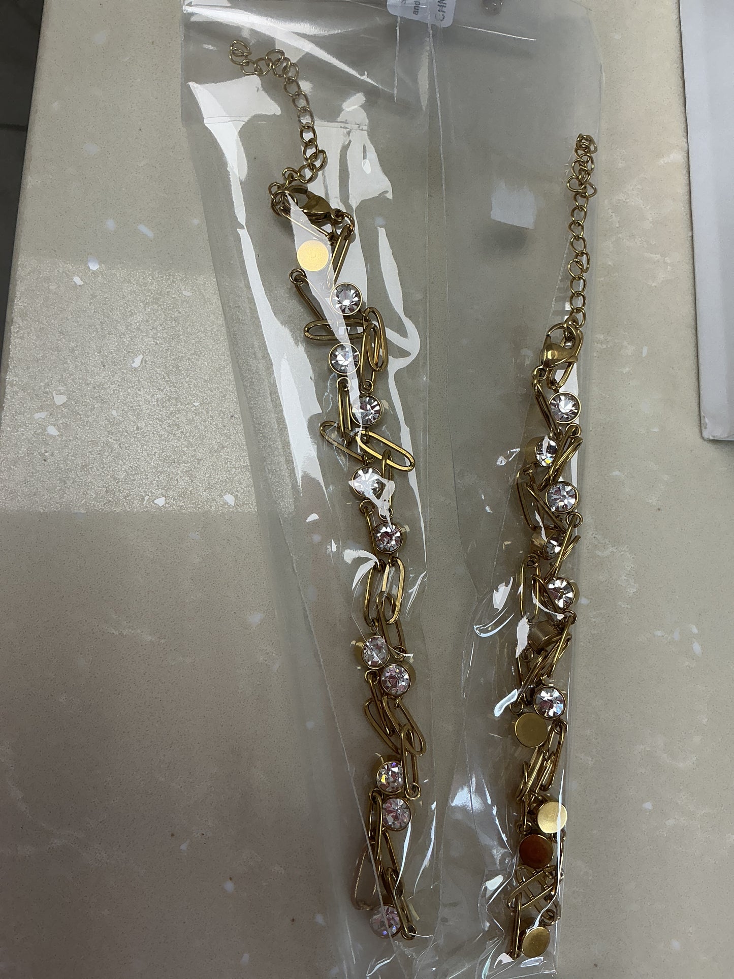 Gold paperclip and diamond necklace