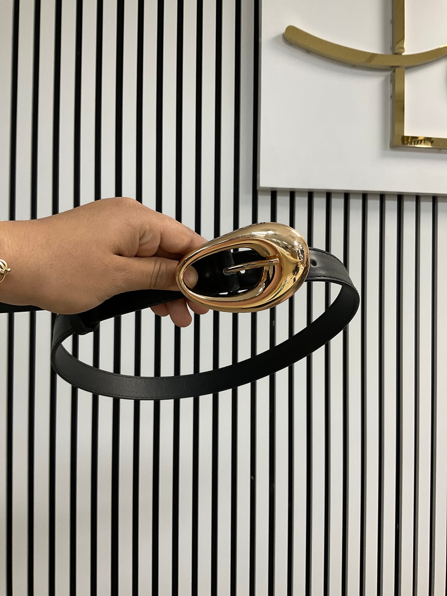 Black belt with round buckle