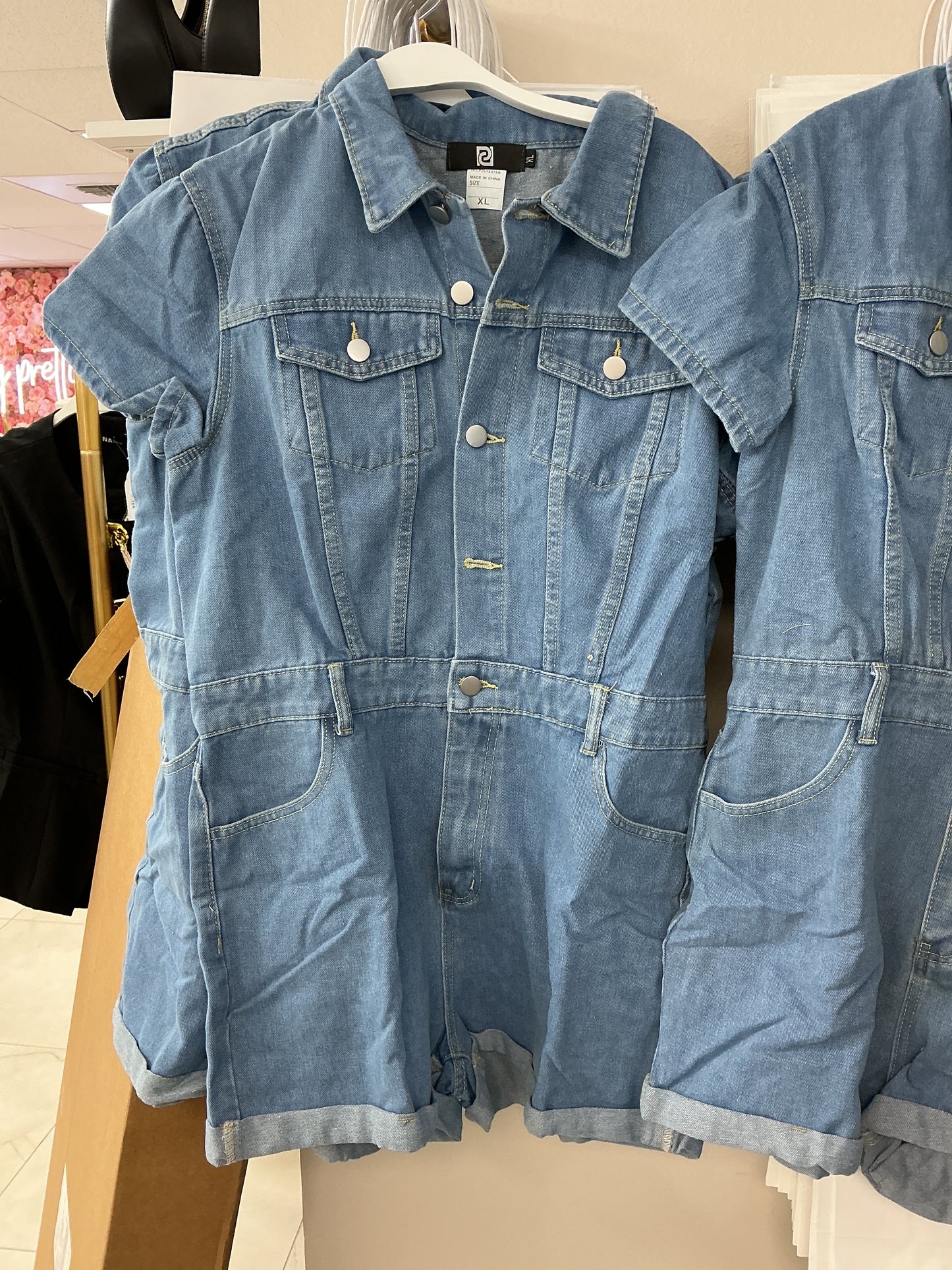 Denim romper with buttons