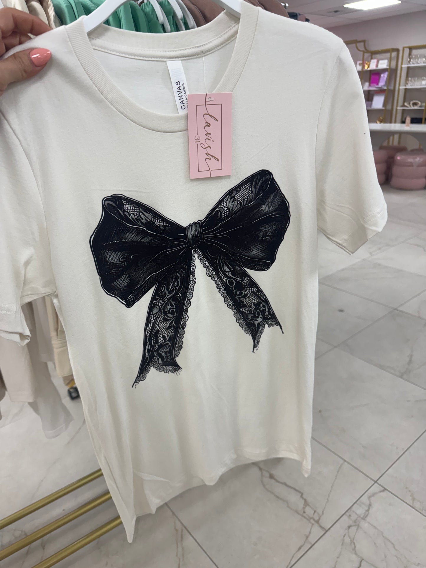 White tee with black bow