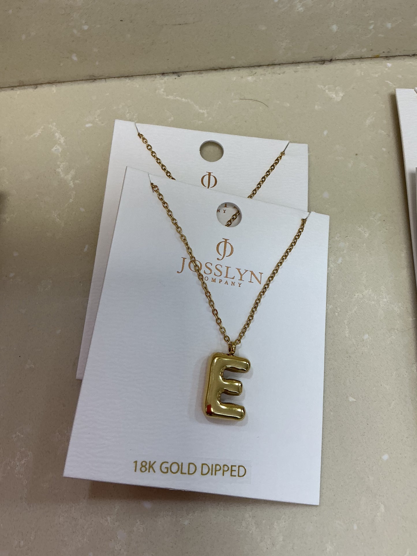 E letter necklace