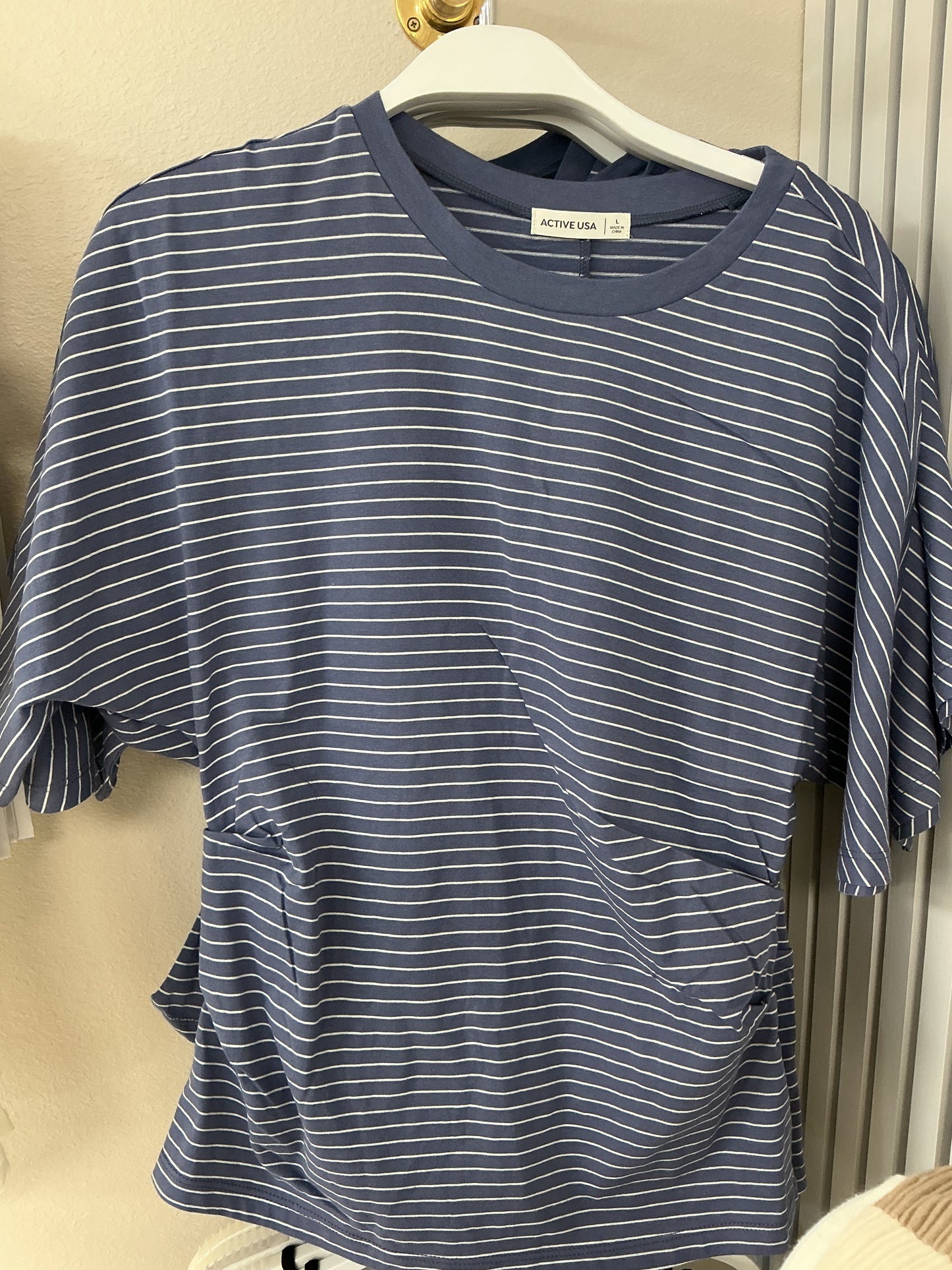 Blue striped top with rouching on the side