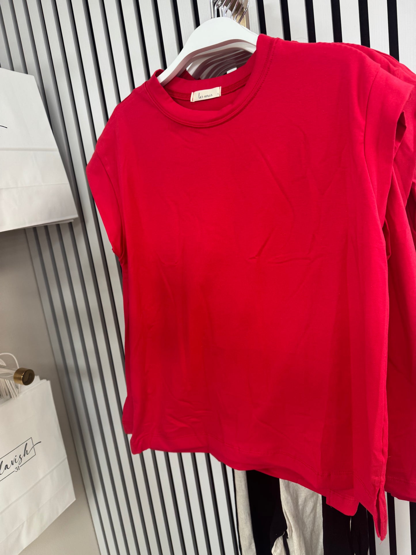 Red sleeveless top