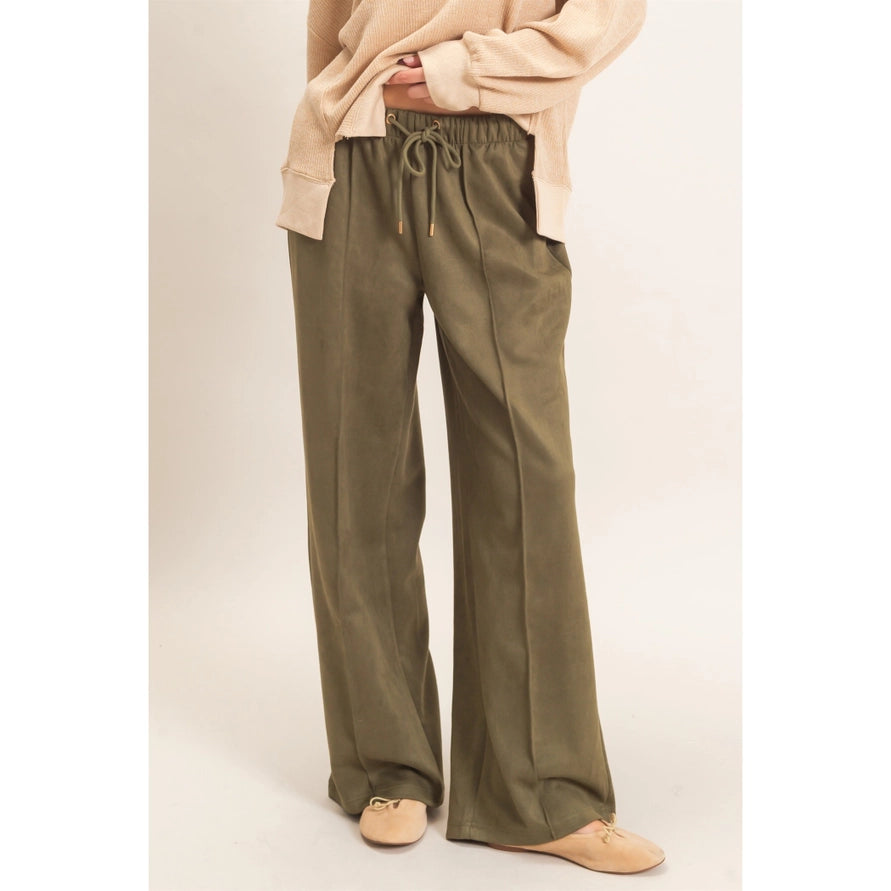 Green suede pants with a middle line
